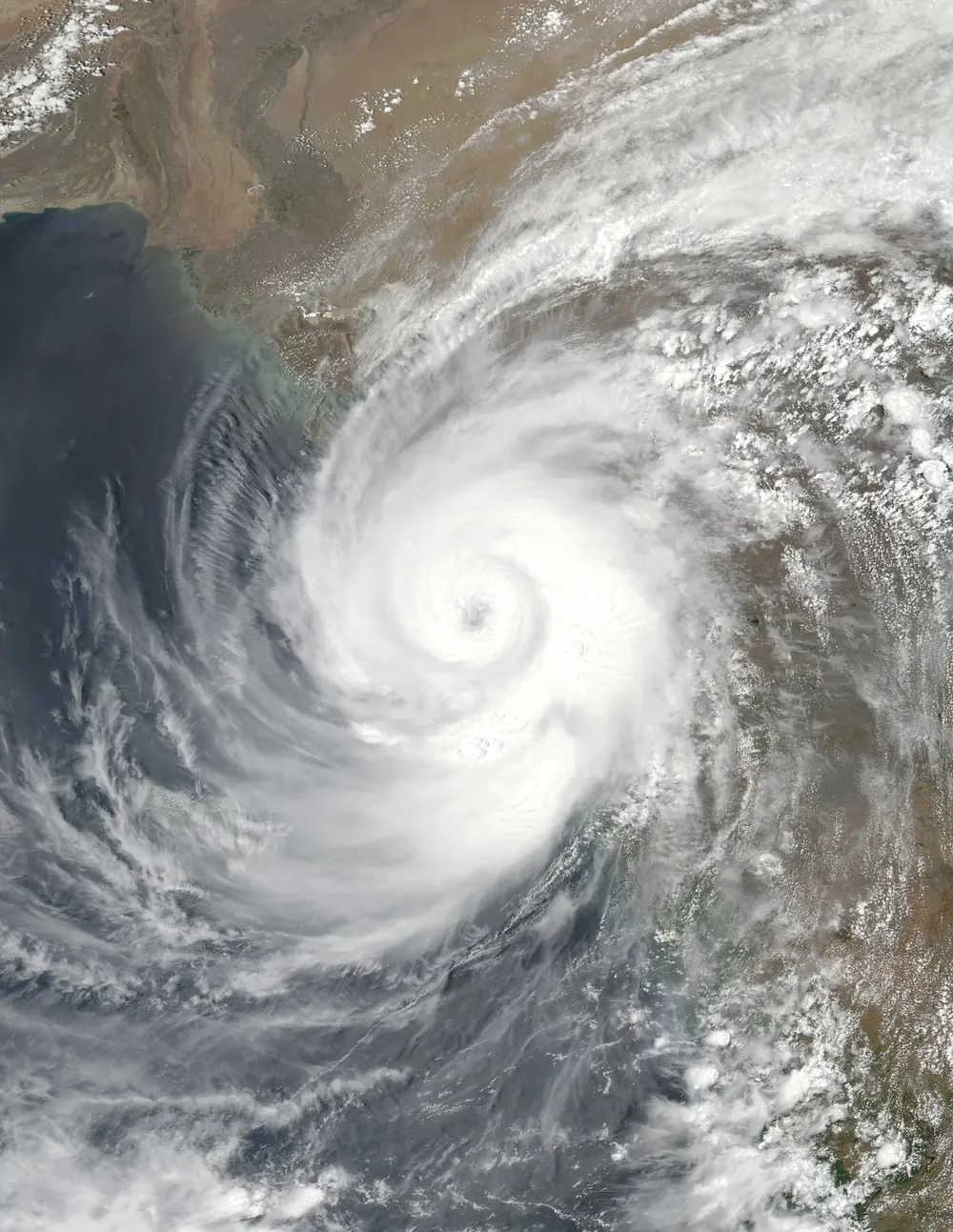 Satellite image of Cyclone Tauktae with a clear eye approaching the coast of Gujarat